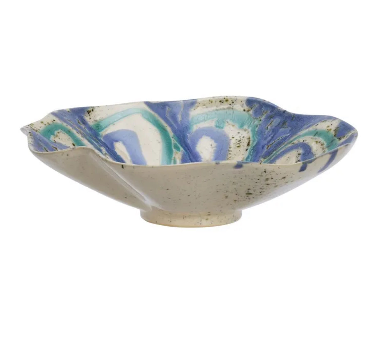 Side view of Ceramic ruffled bowl with blue and green marbled pattern on a white background