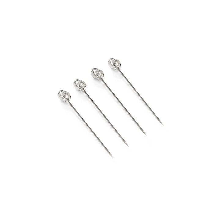 Four silver hairpins with clear gemstones on a white background