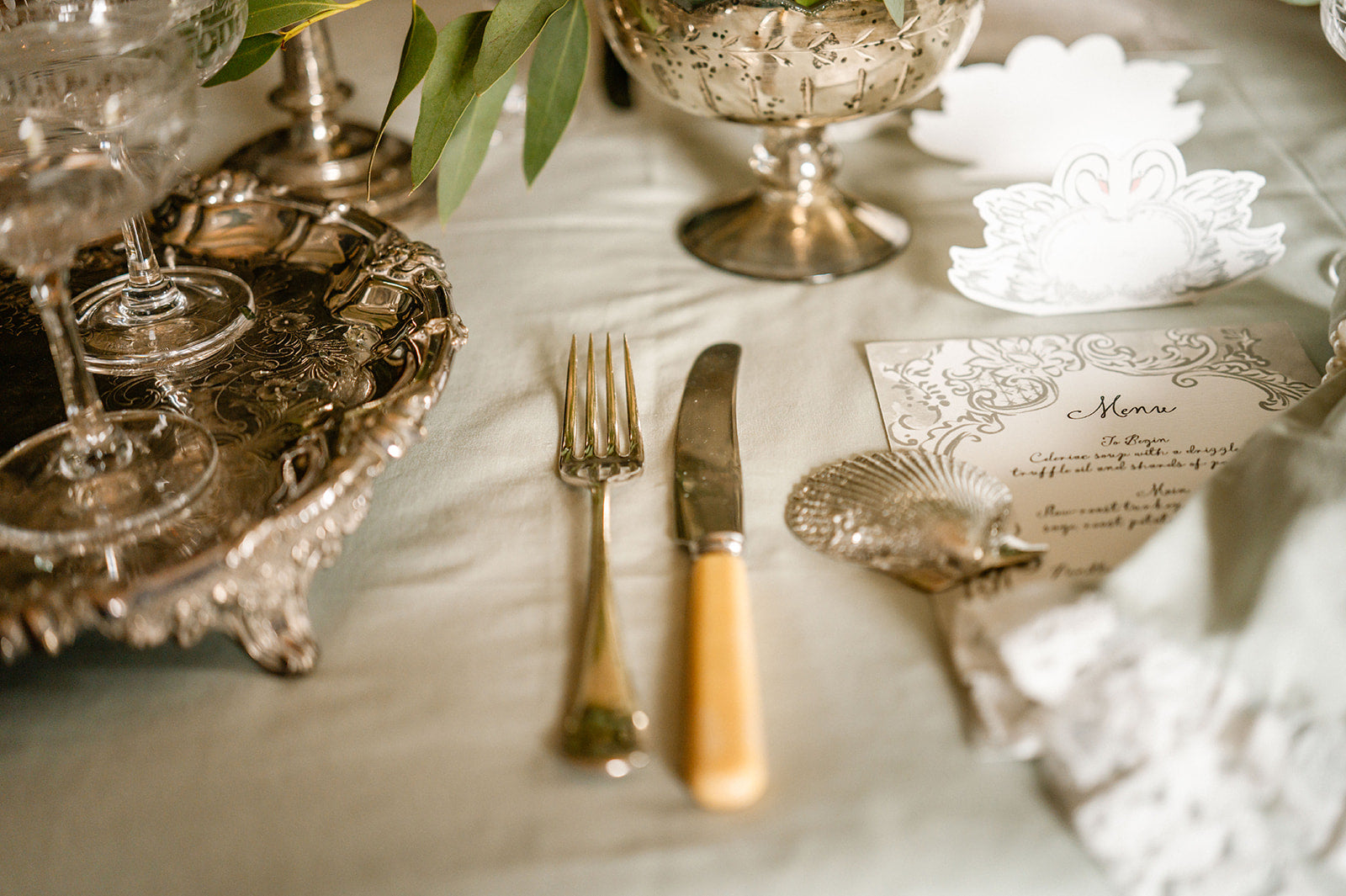 Swan Lake inspired tablesetting with silver and ice blue details
