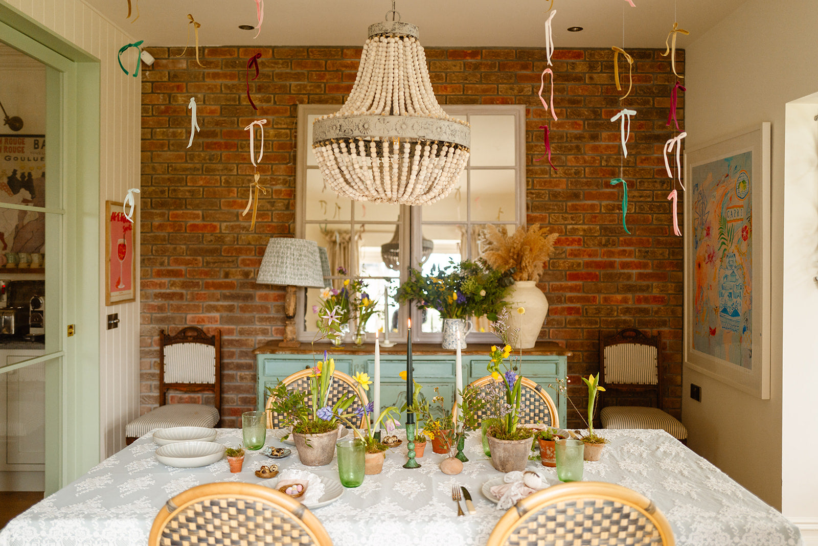 Hanging ribbon garland over table at Amber + Willow