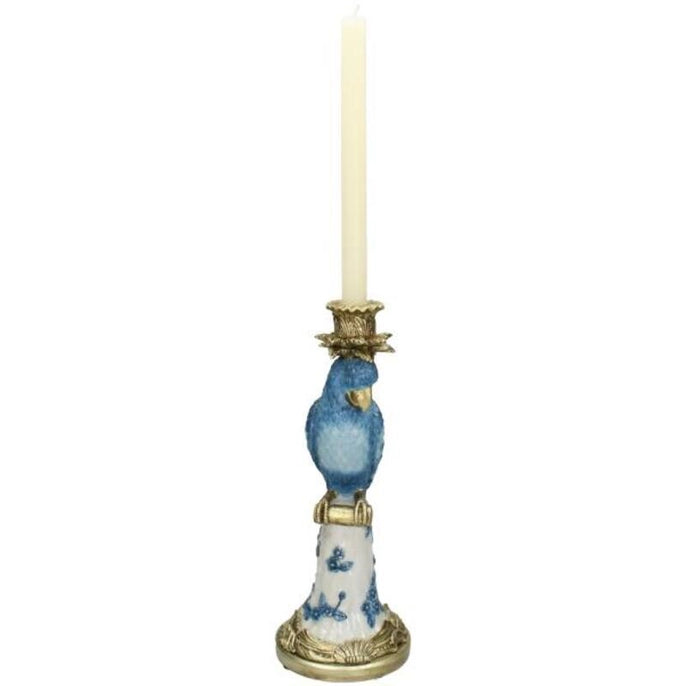 Blue parrot candle holder against white background