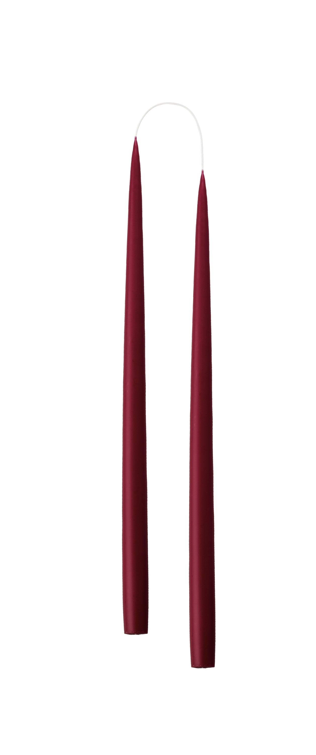 Two burgundy candles on a white background