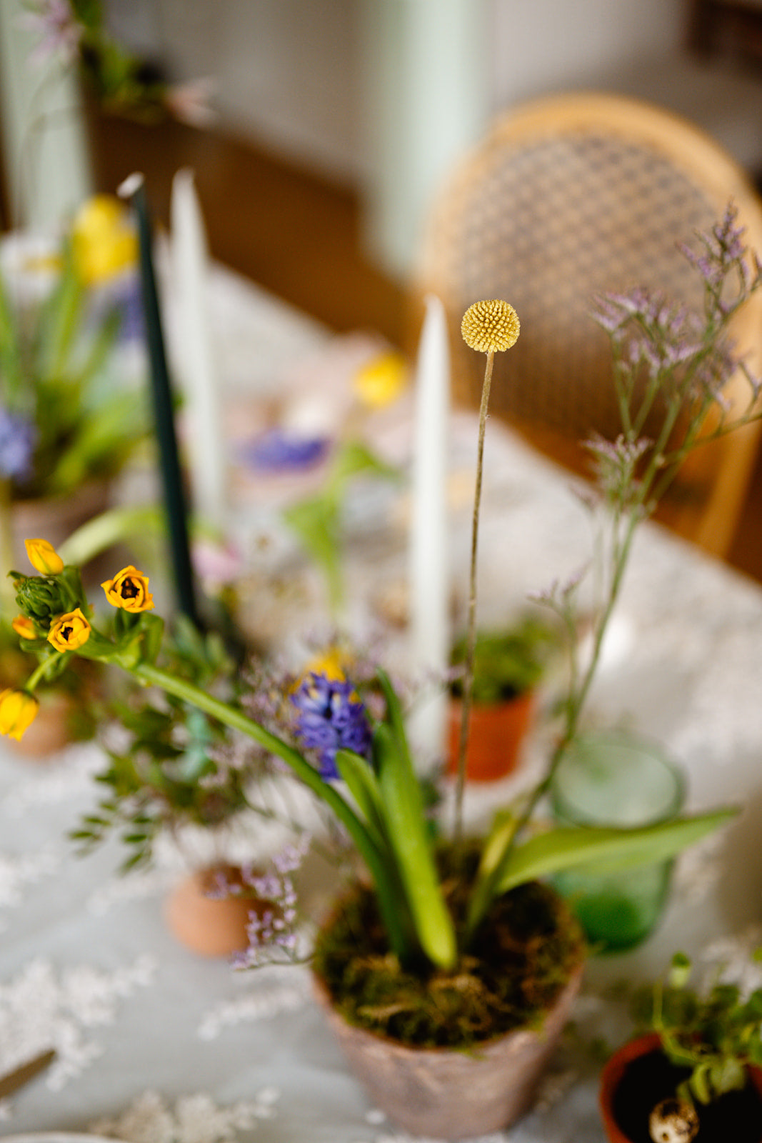 Floral arrangement on a table with a blurred background