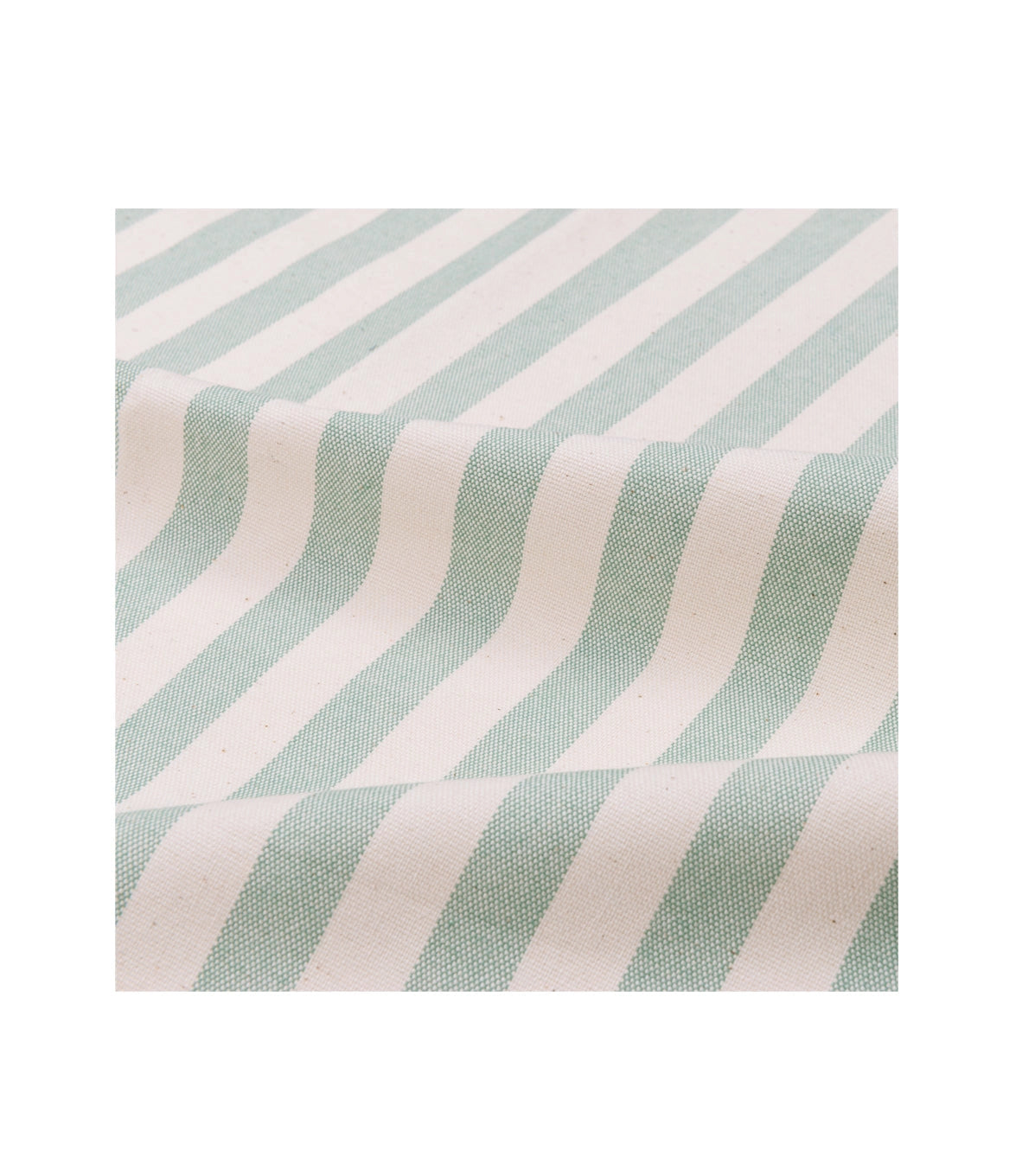 Close up detail shot of rumpled pistachio green and white striped cotton tablecloth