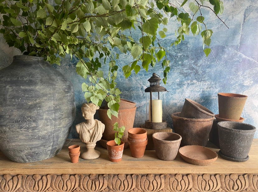 antique grey pot with saucer