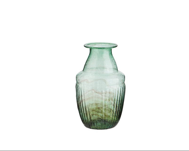 Green glass vase on a white background