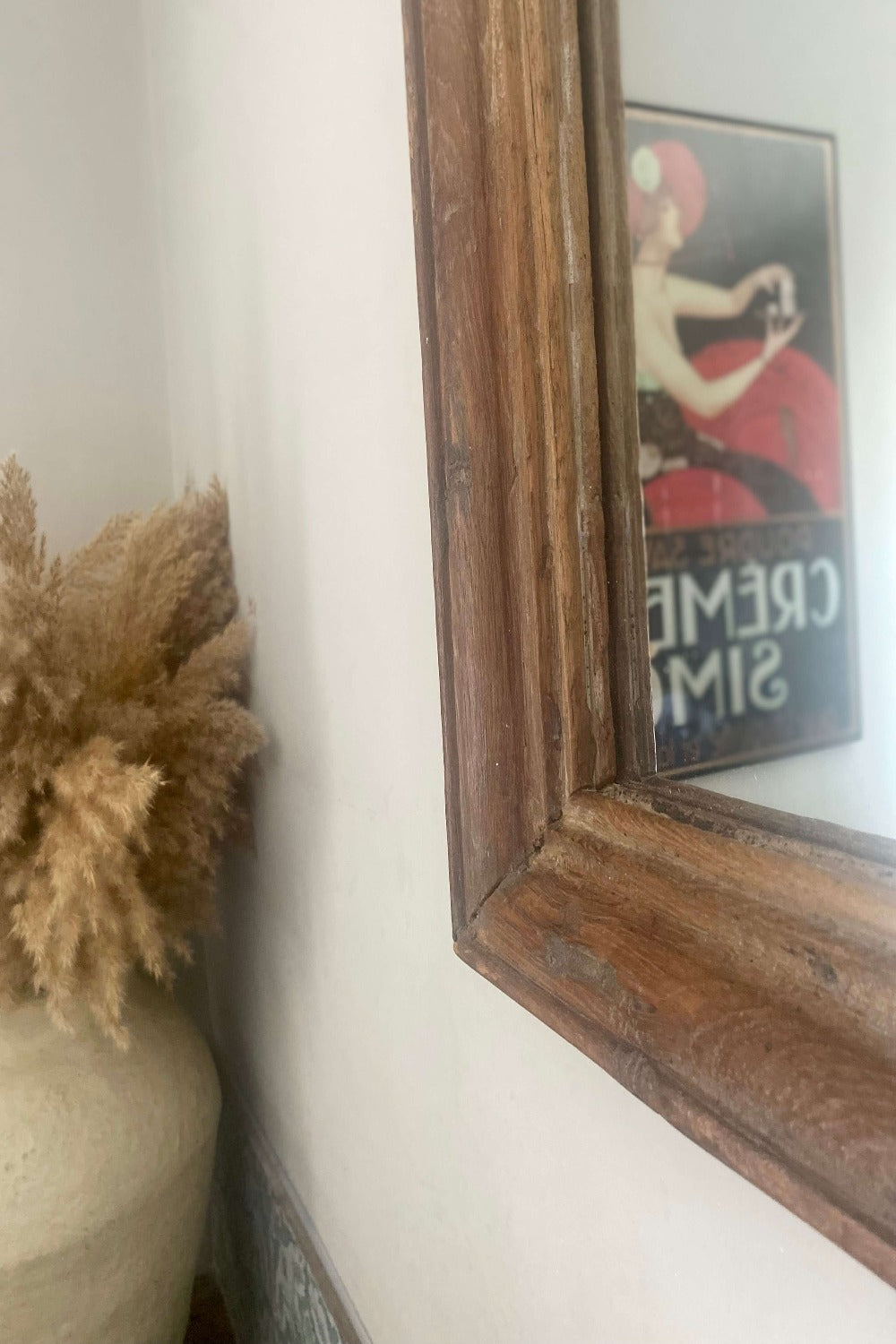 Close up of reclaimed wood mirror frame