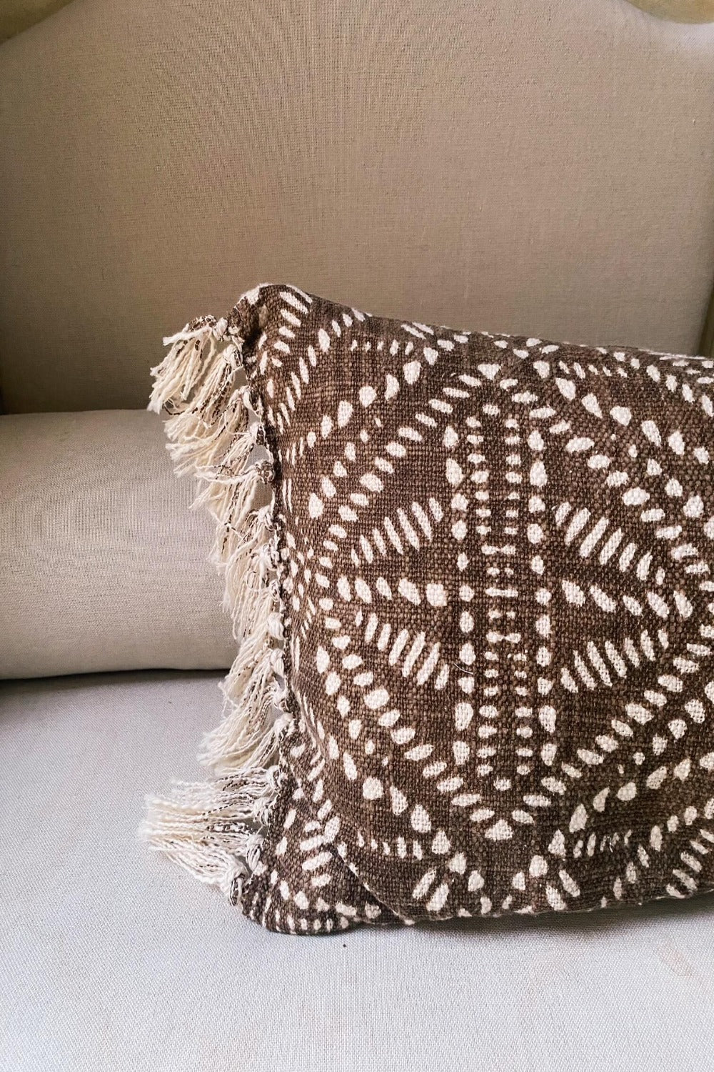 Brown Patterned Cushion With Fringes