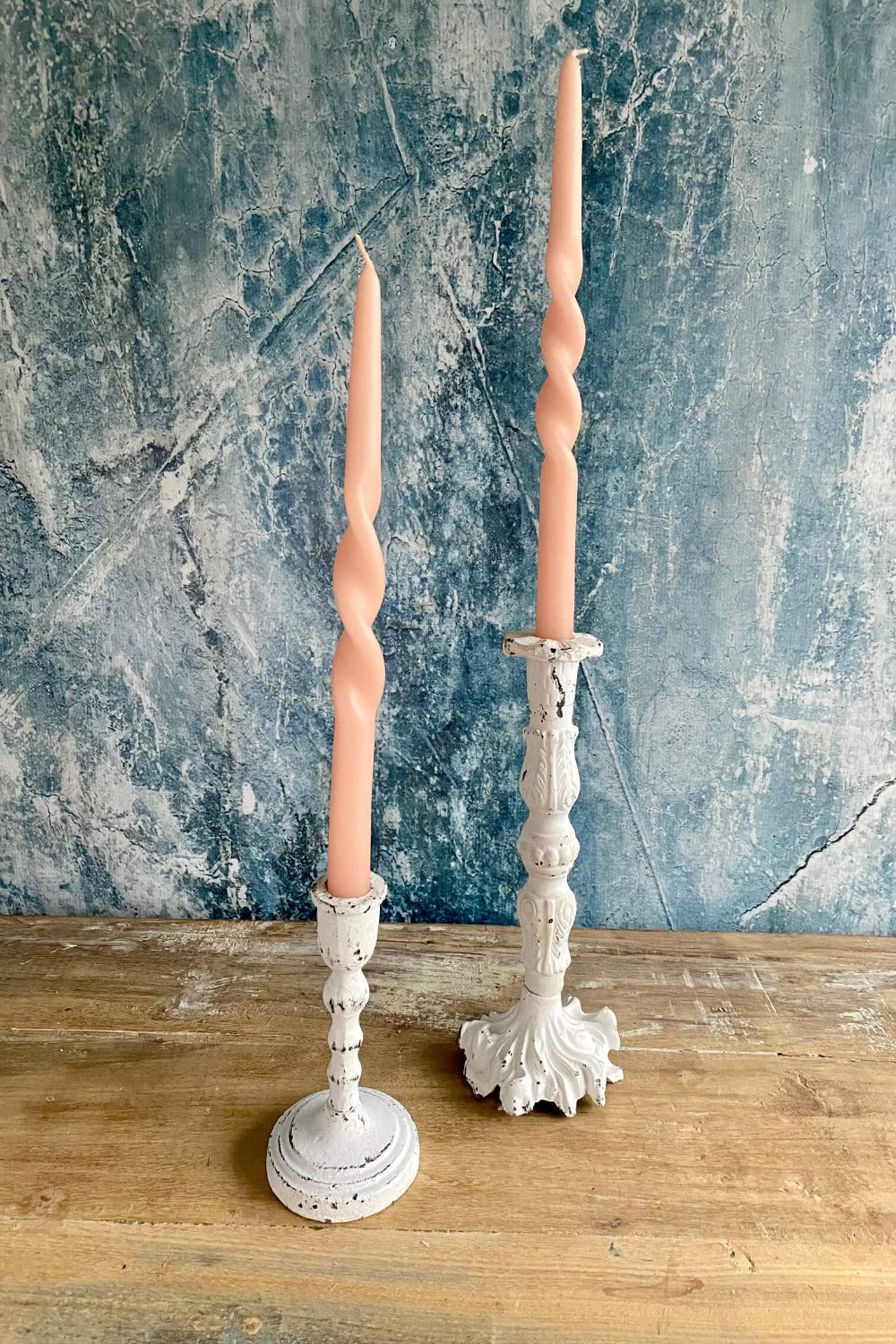 white cast iron candle holder