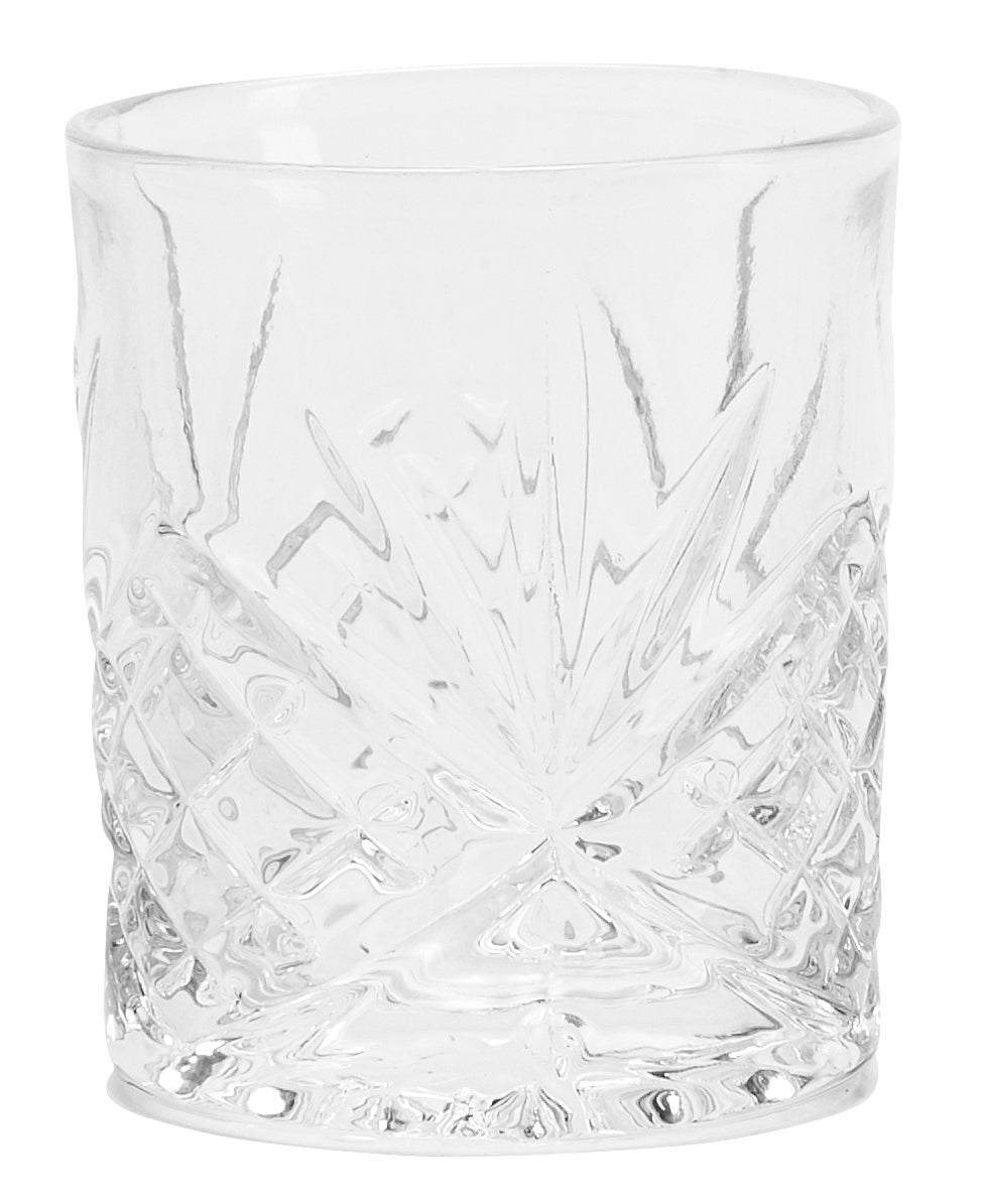 Close up of cut glass tumbler on white background