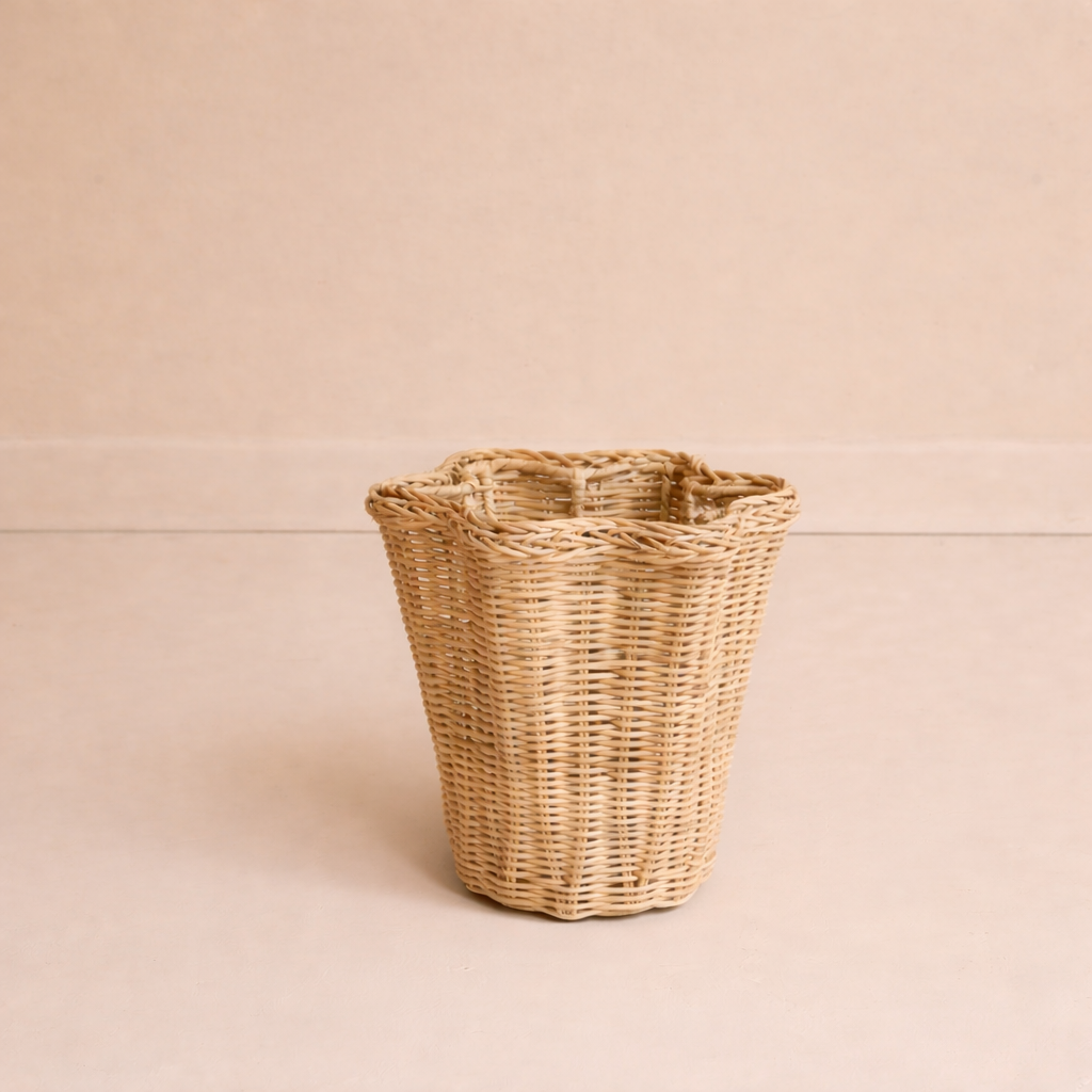 Rattan wavy vase on beige background