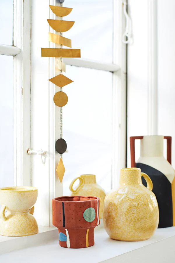 yellow ceramic bud vase with handle