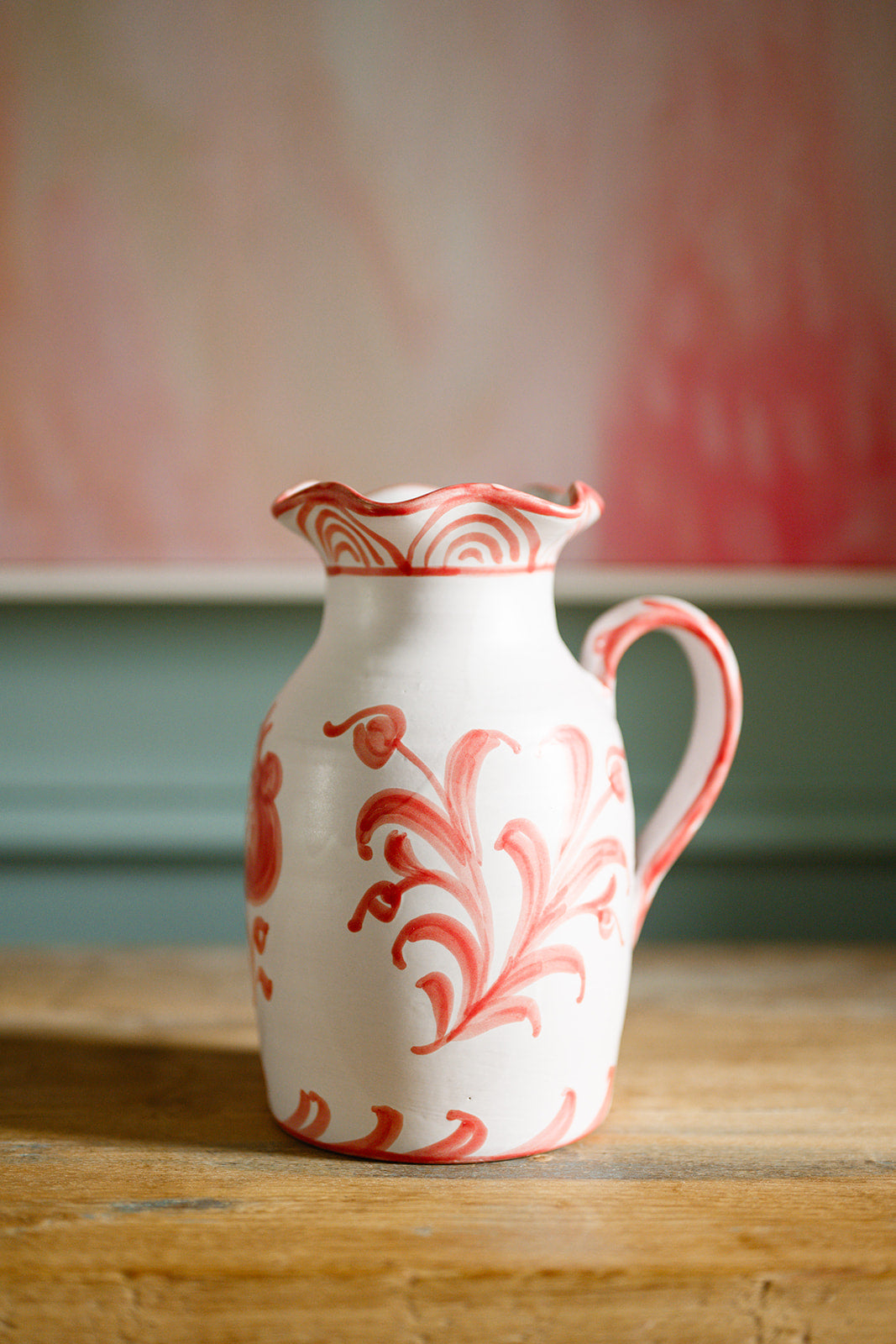 hand painted Spanish ceramic pitcher with scallop neck and coral motif