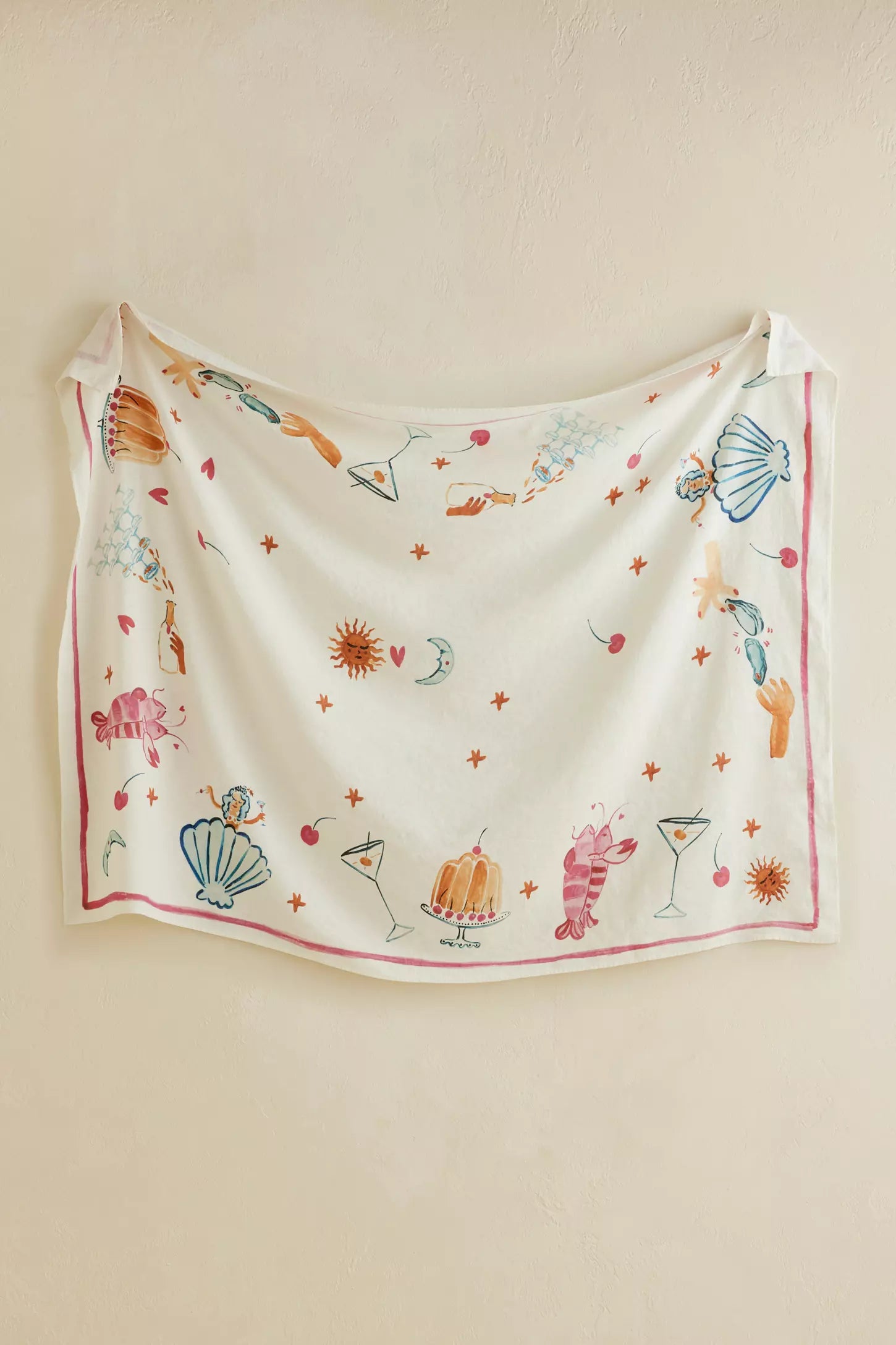 Whimsical hand painted tablecloth at Amber + Willow