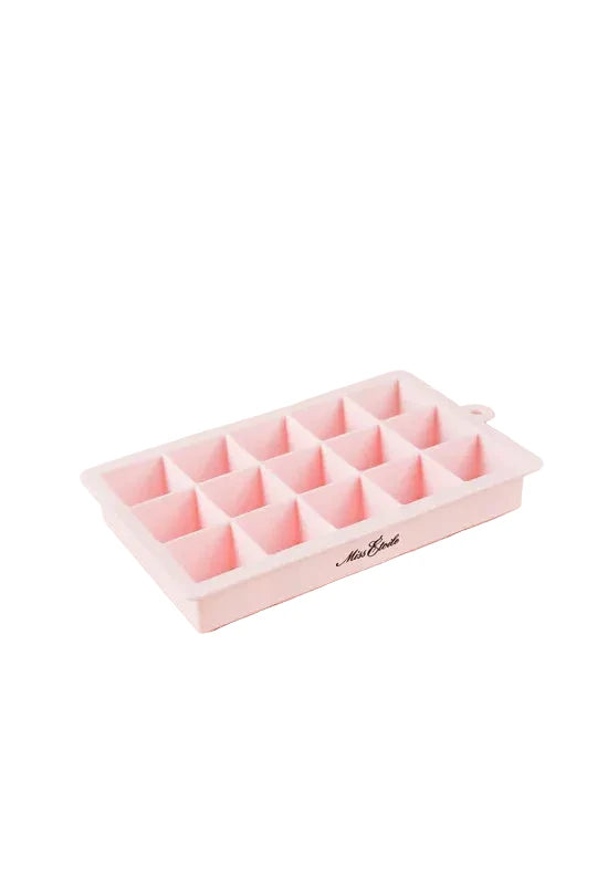 A pink silicone ice cube tray 