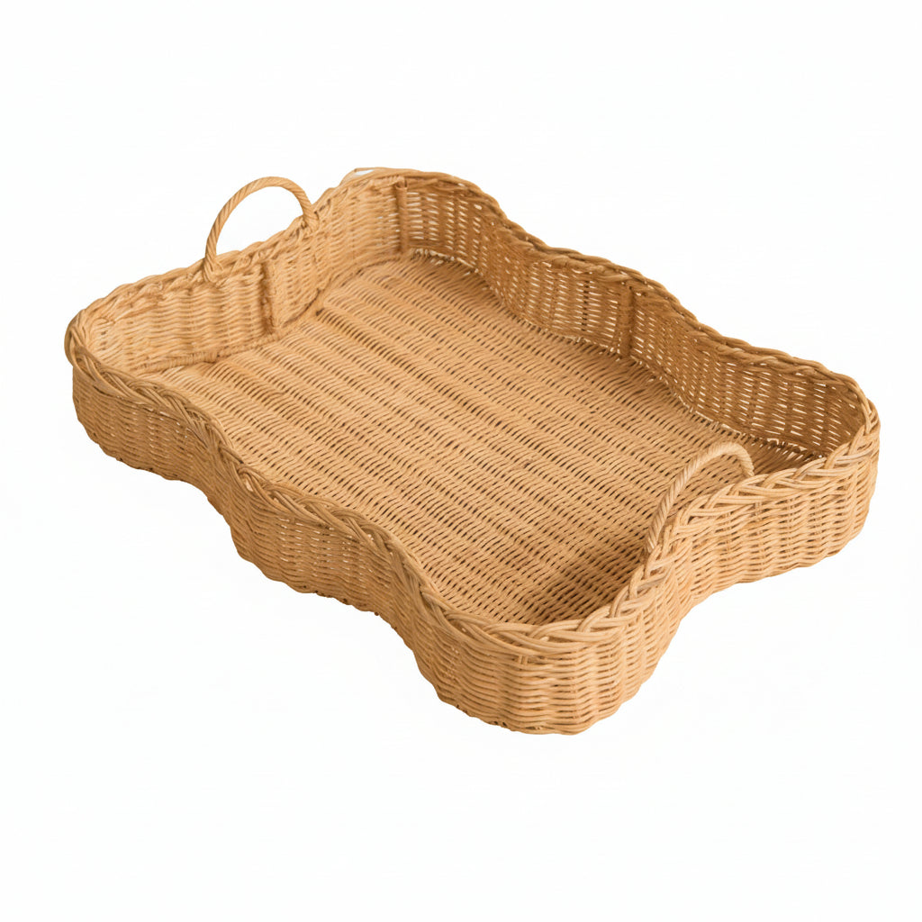 Woven scalloped rattan tray on a white background