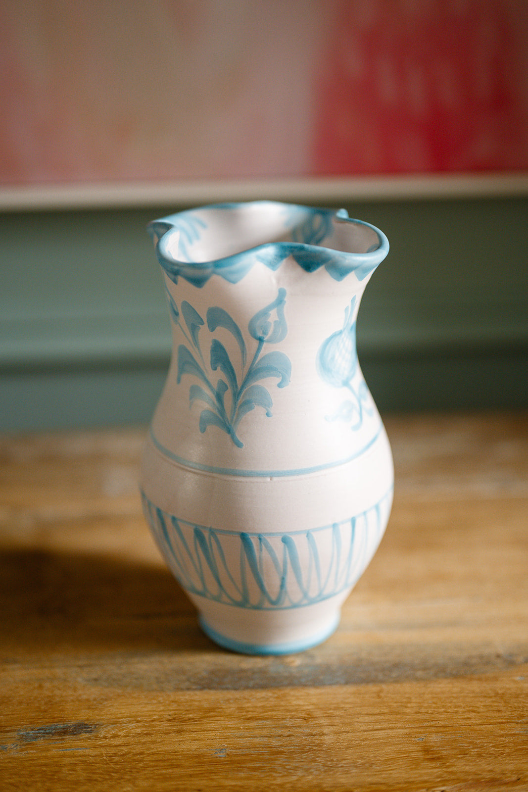 Hand painted Spanish ceramic vase with scallop neck and turquoise motif