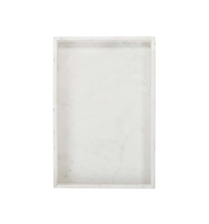 White marble tray against white background
