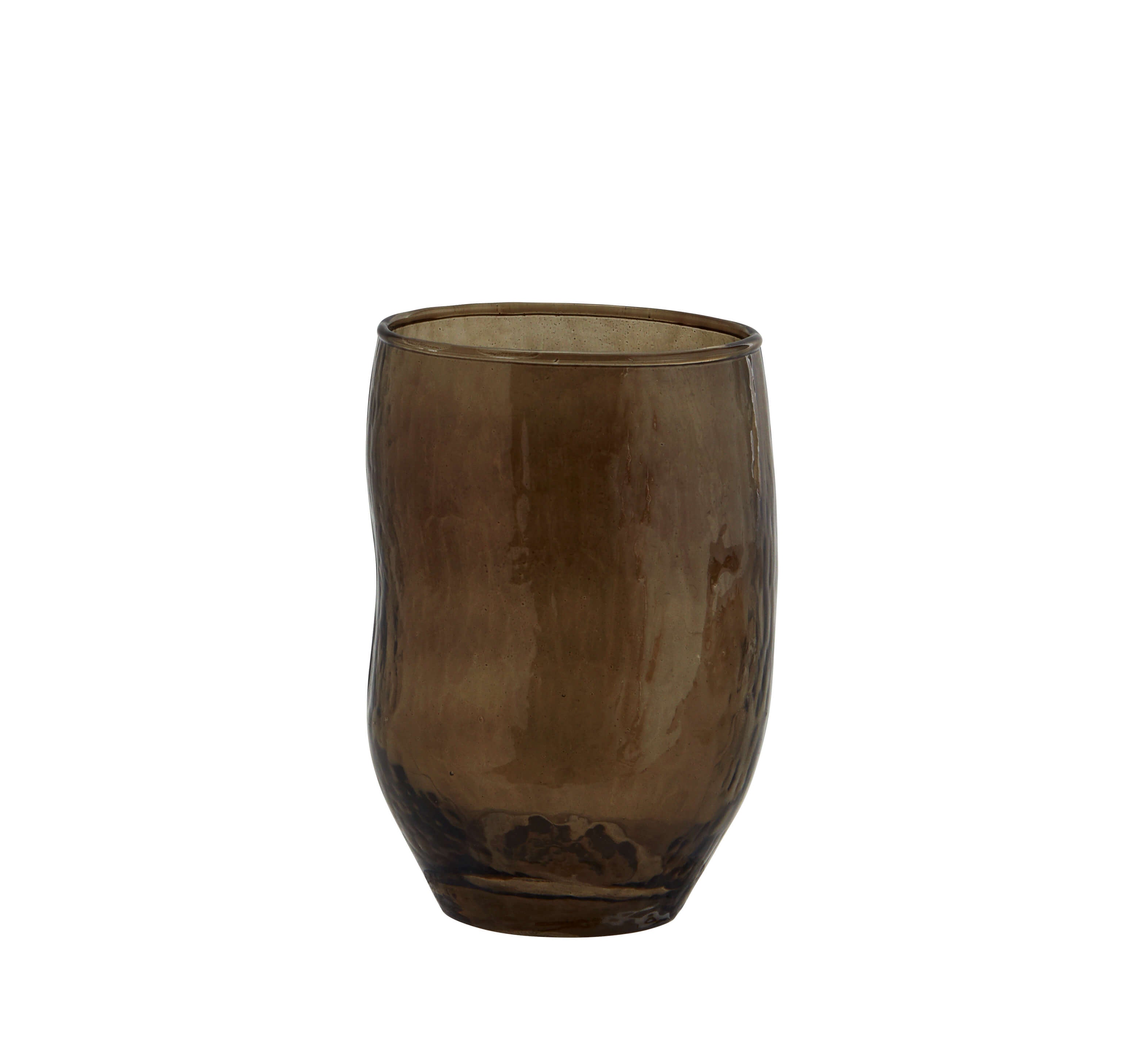 hammered brown drinking glass against white background