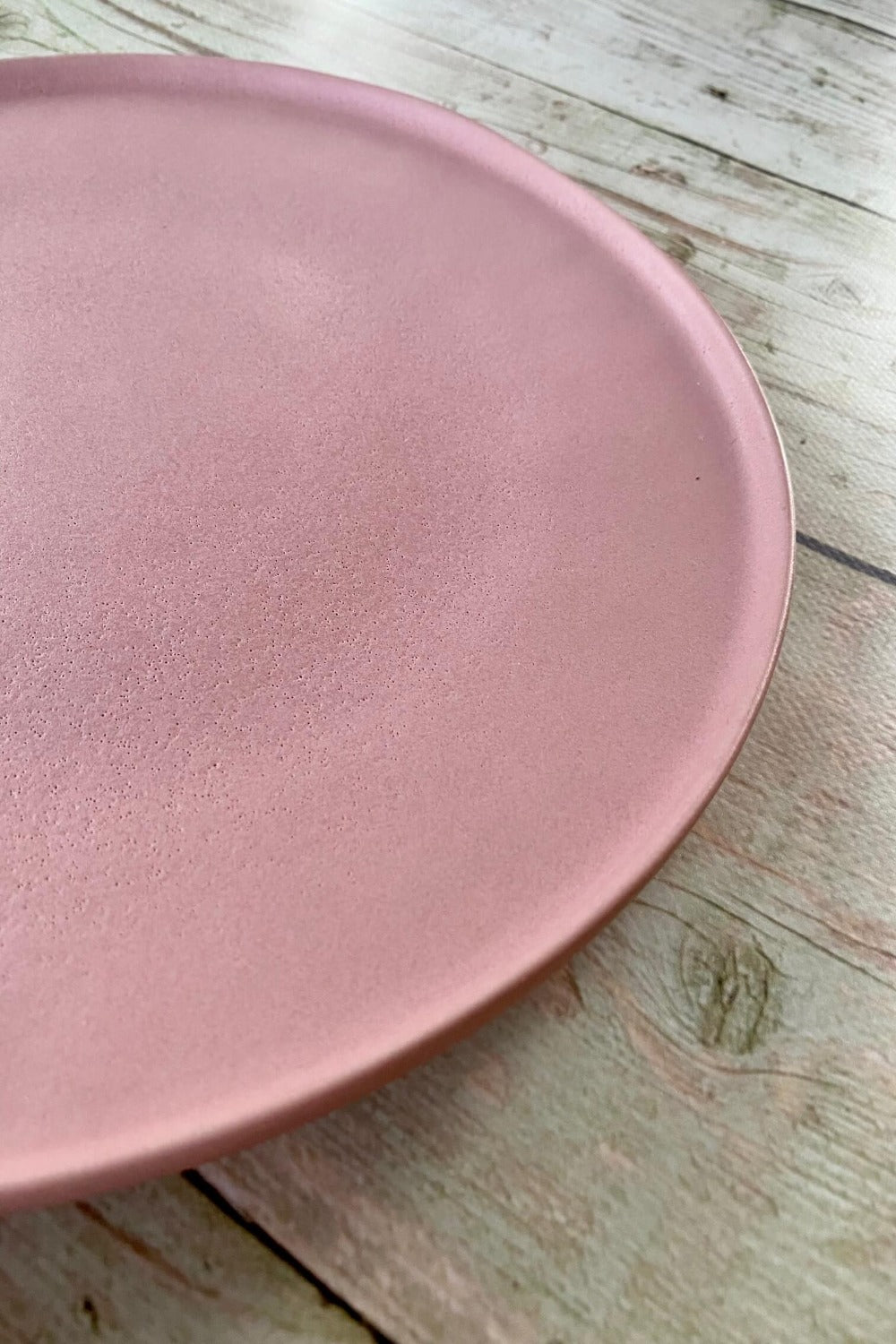 matte pink stoneware plate