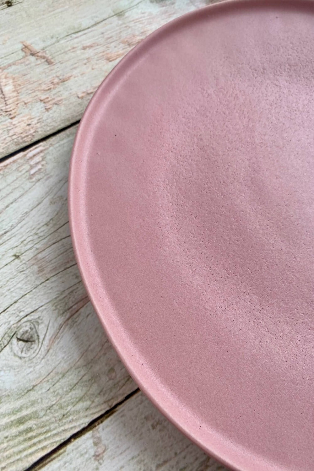 matte pink stoneware plate