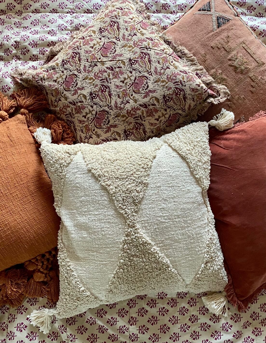 ivory cushion with tassels