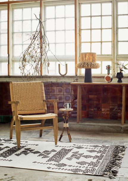 black lamp with raffia shade