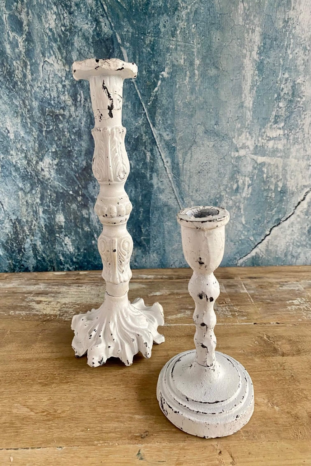 white cast iron candle holder