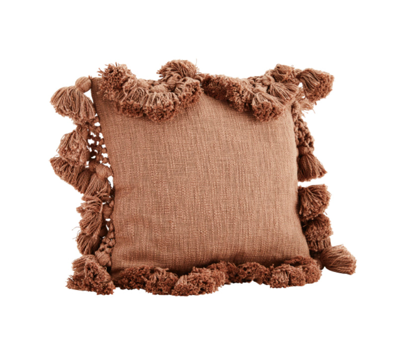 Cushion with tassels