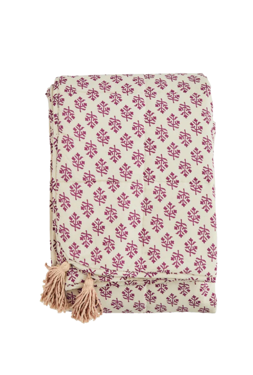 printed cotton quilt with tassels