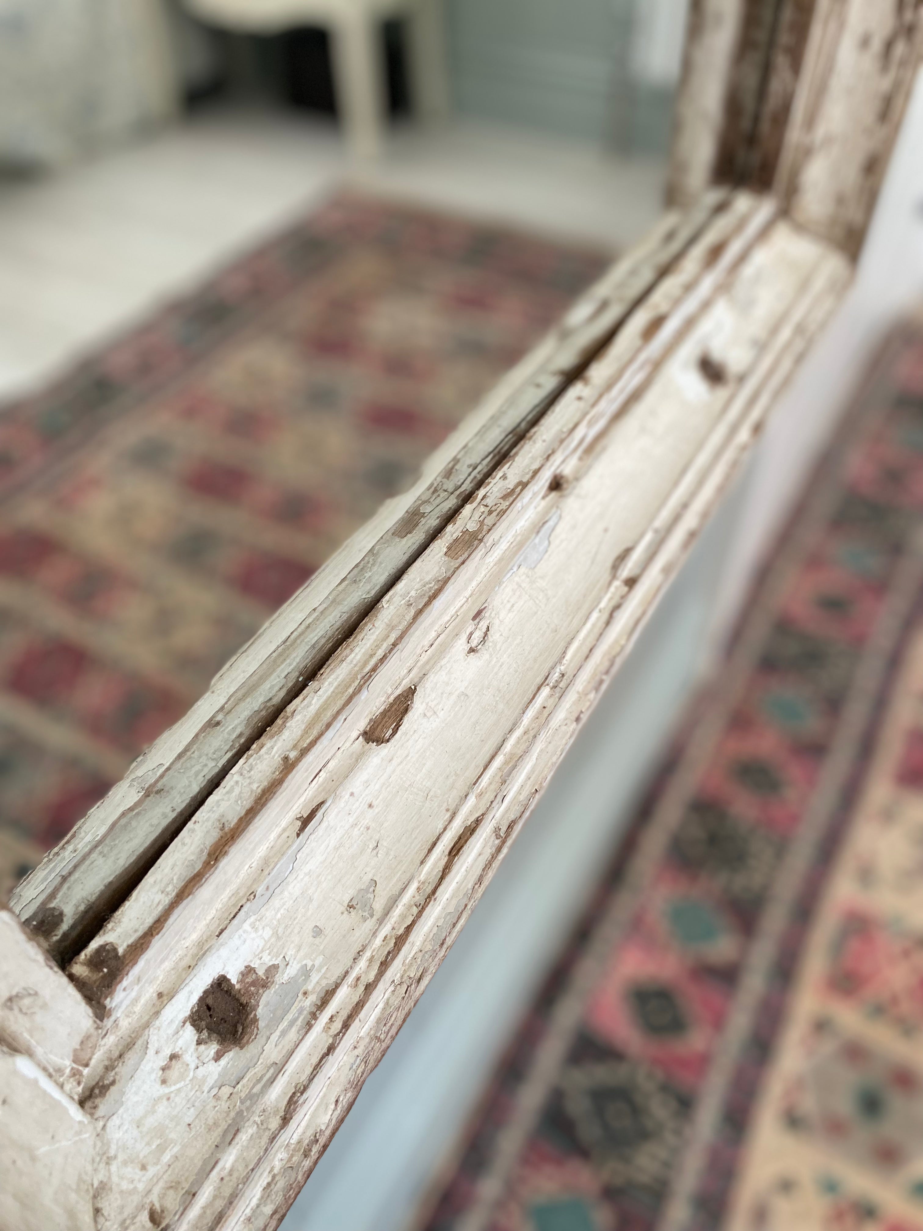 Detail close up shot of wood patina of mirror