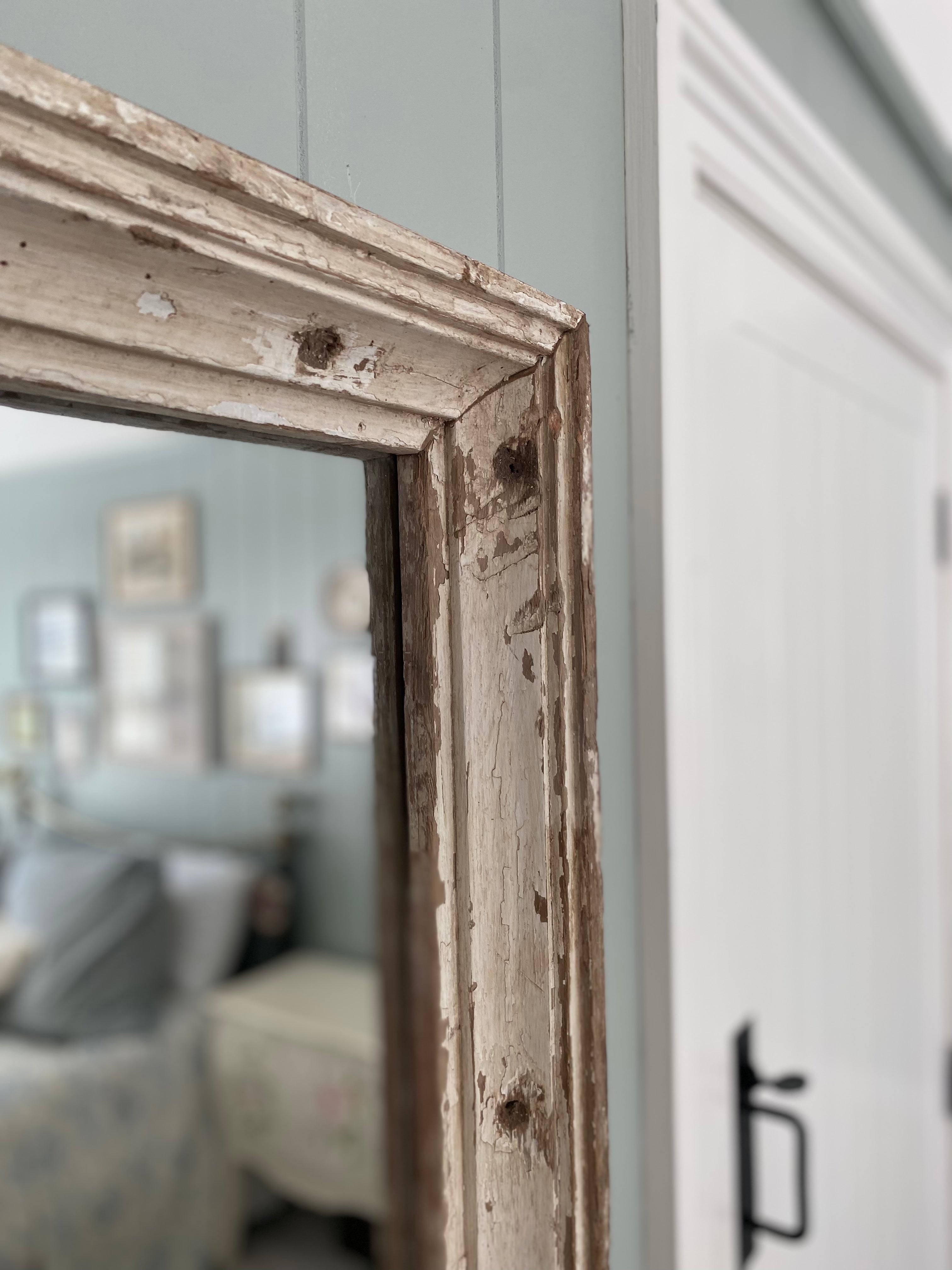 Detail close up shot of wood patina of mirror frame